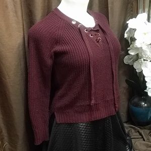 Maroon colored sweater